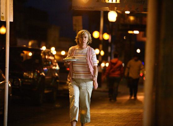 Jennifer-Ludlum-_Lorna_-Lorna-marches-down-the-street-to-bring-Barry-his-home-cooked-dinner.jpg