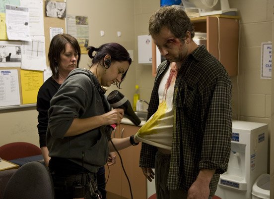 Nina-Edwards-_Wardrobe-Designer__-Hannah-Woods-_Wardrobe-Standby__-and-Scott-Wills-_Barry_-Hannah-and-Nina-prepare-Barry-for-his-jail-scene.jpg