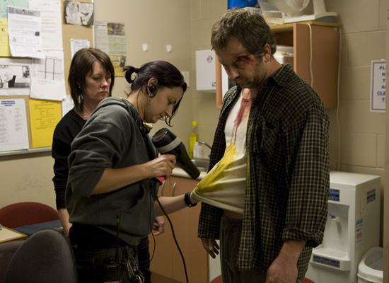 Nina-Edwards-_Wardrobe-Designer__-Hannah-Woods-_Wardrobe-Standby__-and-Scott-Wills-_Barry_-Hannah-and-Nina-prepare-Barry-for-his-jail-scene.jpg